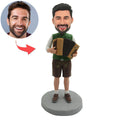 Custom Bobblehead Sitting On a Suitcase