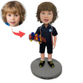 Custom Bobblehead Sitting On a Suitcase