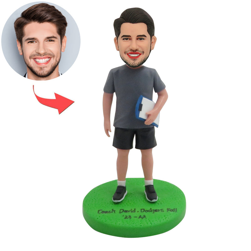 Custom Bobblehead Sitting On a Suitcase