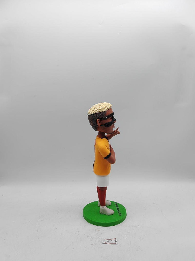 Side view of sports player statue